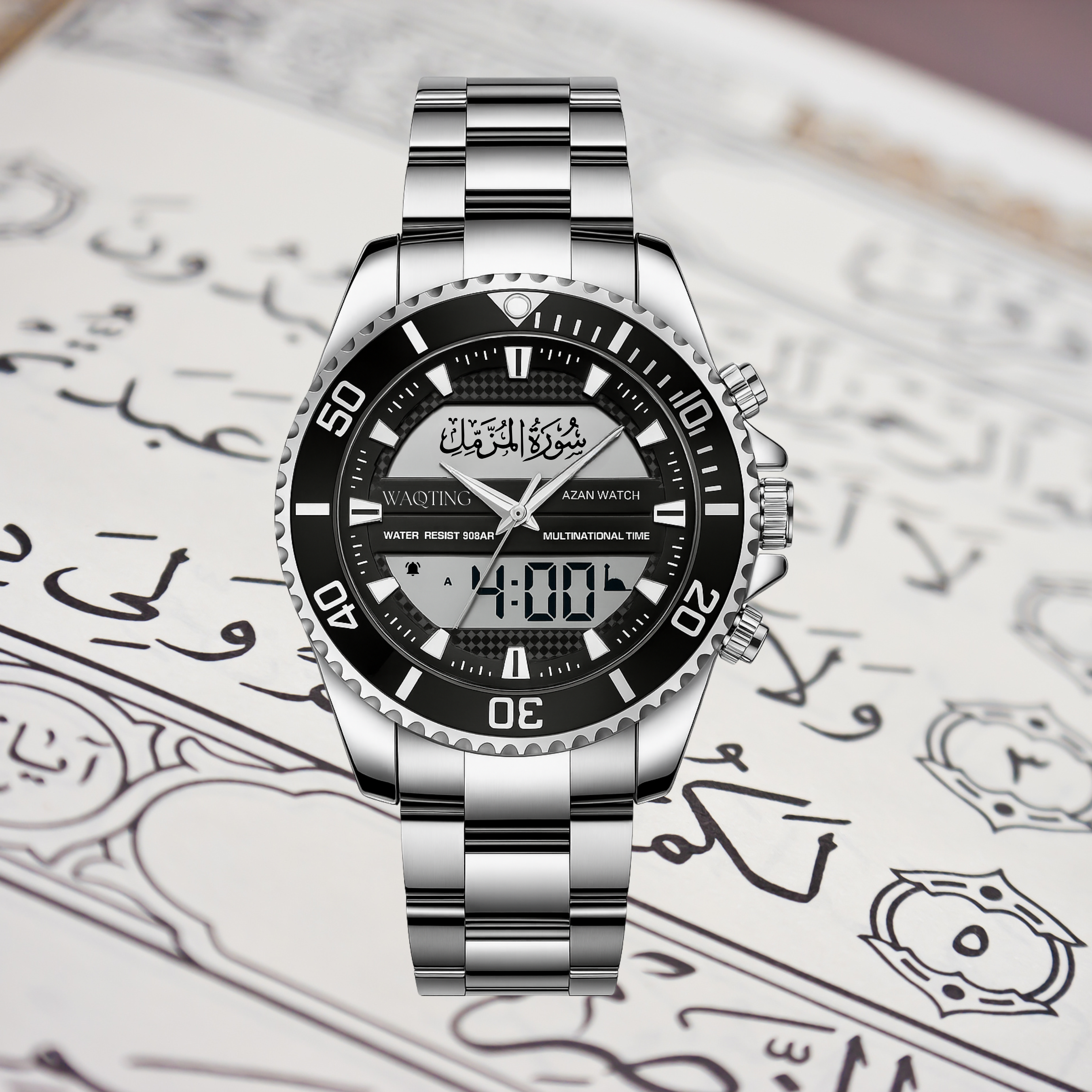 Silver watch with black face on a textured background