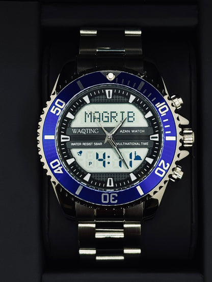 Digital watch with blue bezel and silver band on a black background