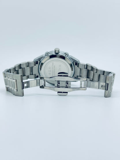 Silver watch with a metal band on a white background