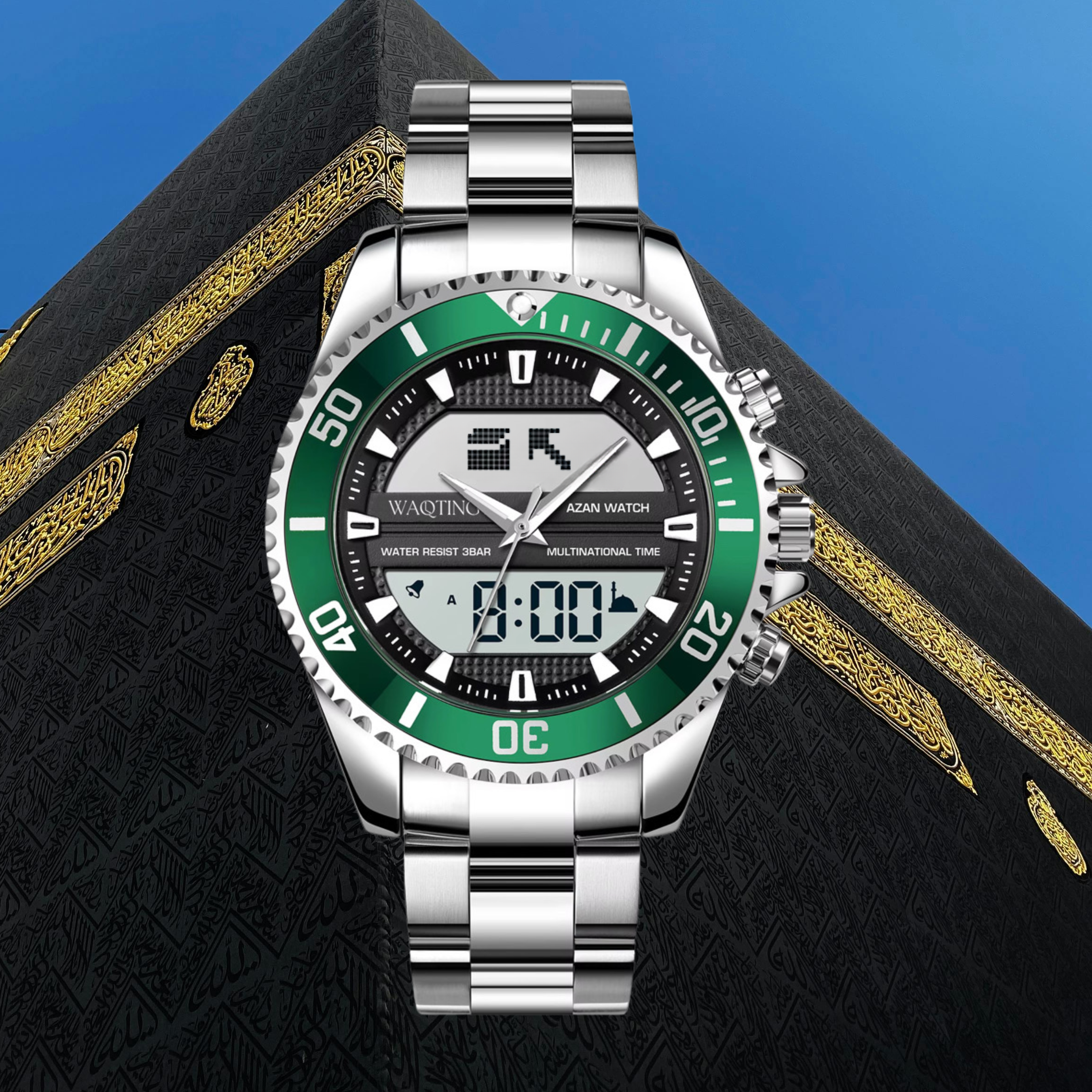 Silver watch with green dial on a black and gold textured surface